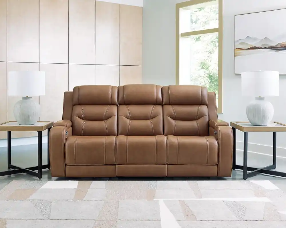 Ashley Knightington Leather Power Reclining Sofa with Sound System in Caramel